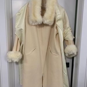 Linda Lundstrom cream fall/winter coat. The coat is like new, size 10.